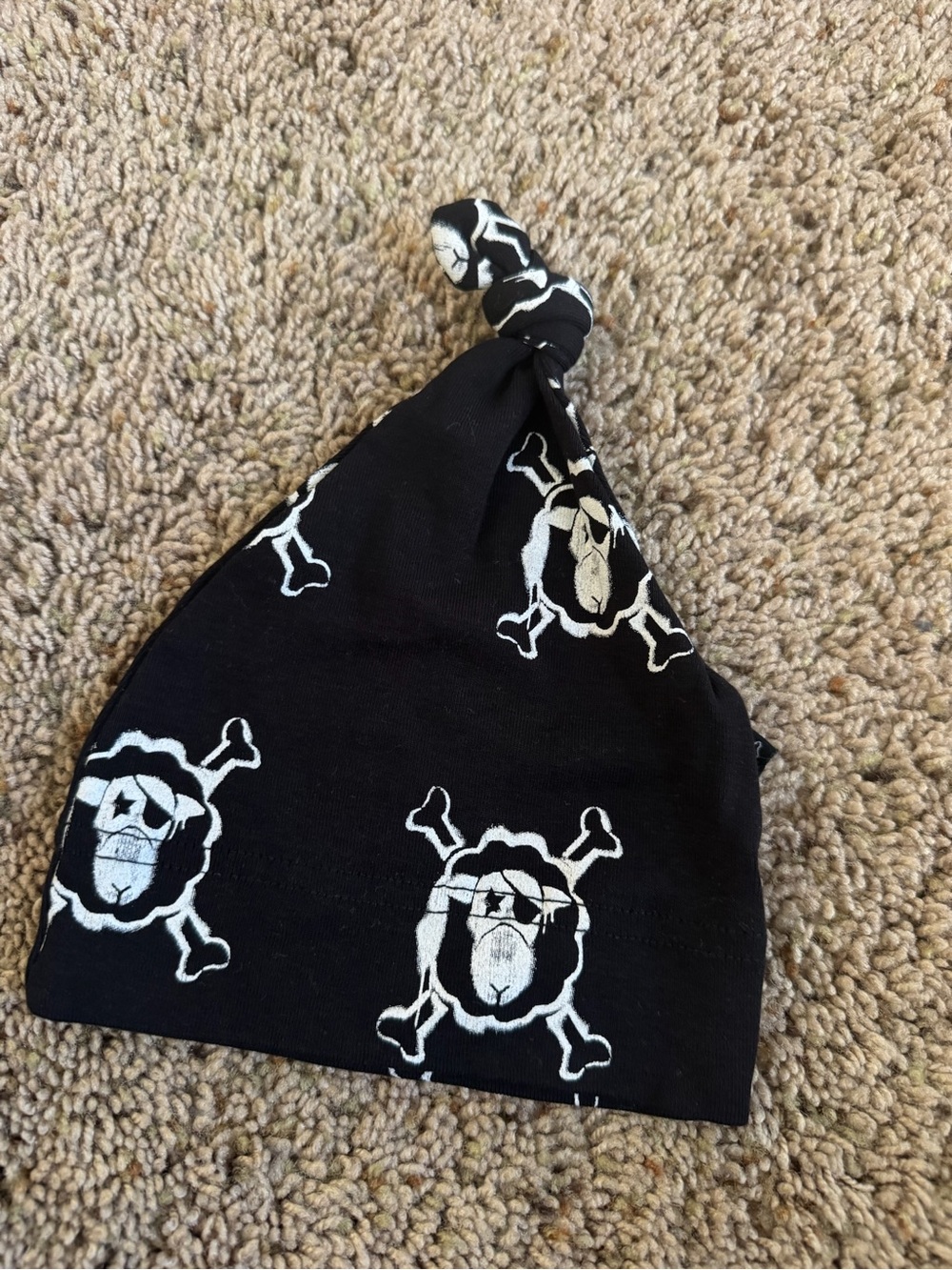 nununu Black Knot Beanie with White Skull Print